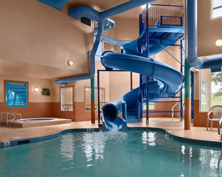 Small view of available recreational facilities at Days Inn Red Deer, Alberta such as an indoor pool, giant waterslide, and hot tub.
